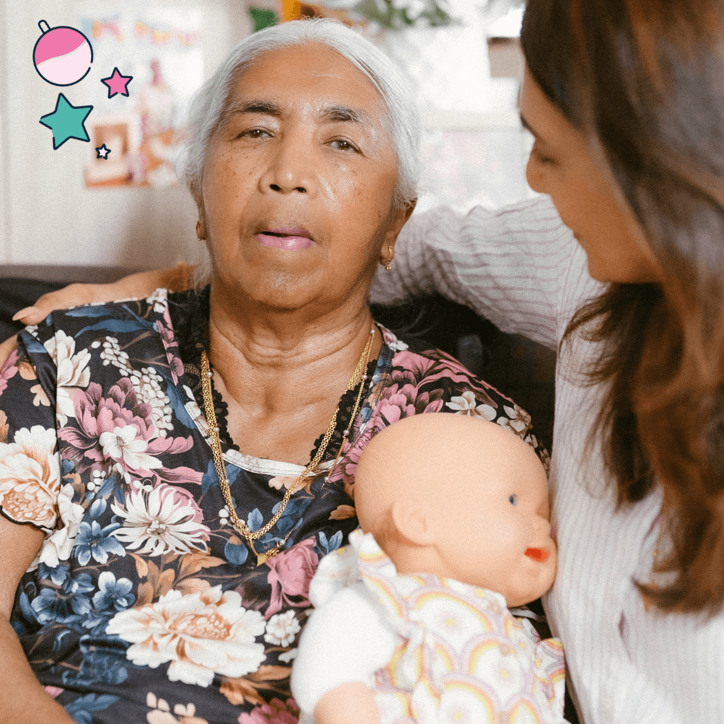 Mallika being embraced by her daughter.