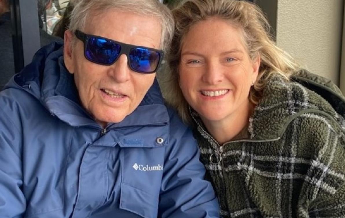 Dementia Advocate Simone with her father who is wearing sunglasses.