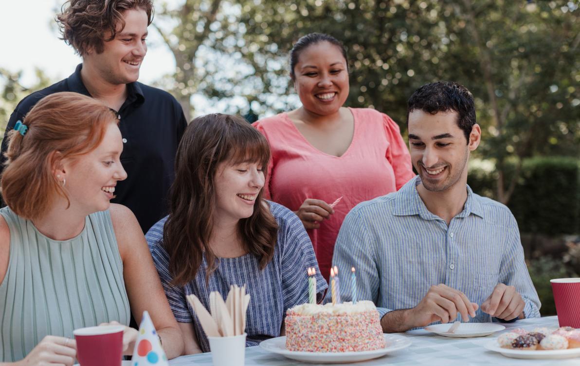 People celebrating together at a birthday party.